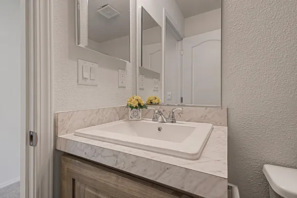 a bathroom with a sink and a toilet