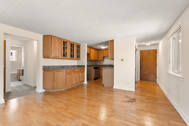 a view of a kitchen with a kitchen and a sink