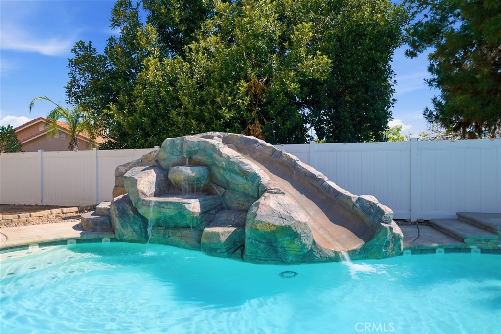 855 Viewtop Circle Corona, CA 92881 - Photo 30 of 52 a backyard of a house with lots of green space