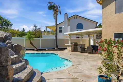 a view of a backyard with plants