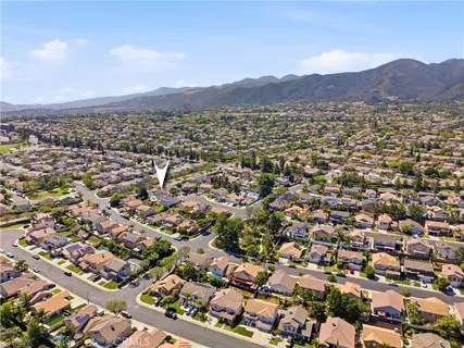 an aerial view of residential building and trees