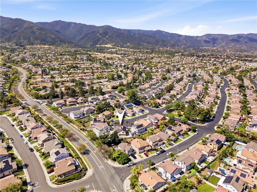 855 Viewtop Circle Corona, CA 92881 - Photo 51 of 52 an aerial view of residential house and car parked