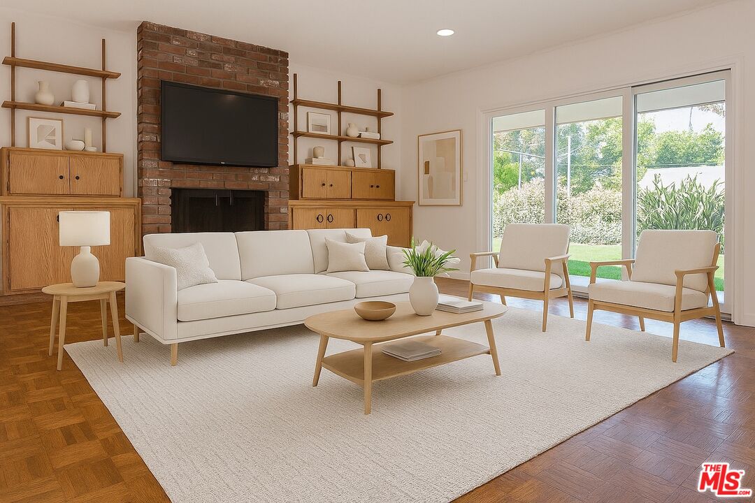 13104 West Magnolia Boulevard Sherman Oaks, CA 91423 - Photo 13 of 27 a living room with furniture a flat screen tv and a large window