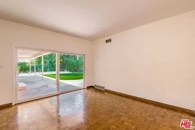 a view of an empty room with window