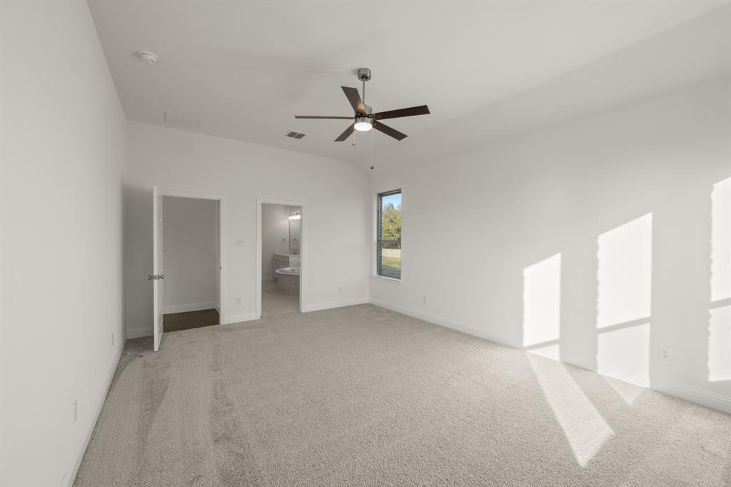 701 Seahawk Street Joshua, TX 76058 - Photo 11 of 30 wooden floor in an empty room with a window