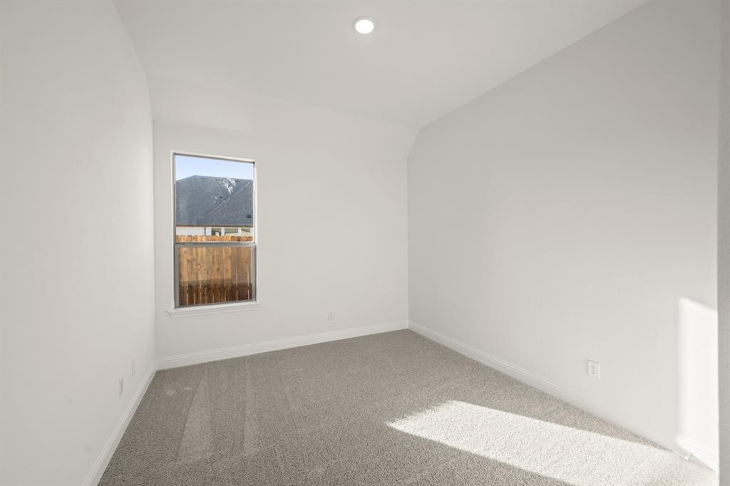 701 Seahawk Street Joshua, TX 76058 - Photo 19 of 30 an empty room with a window