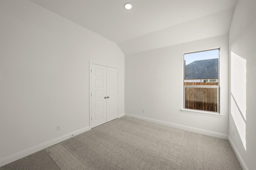 701 Seahawk Street Joshua, TX 76058 - Photo 20 of 30 an empty room with a window