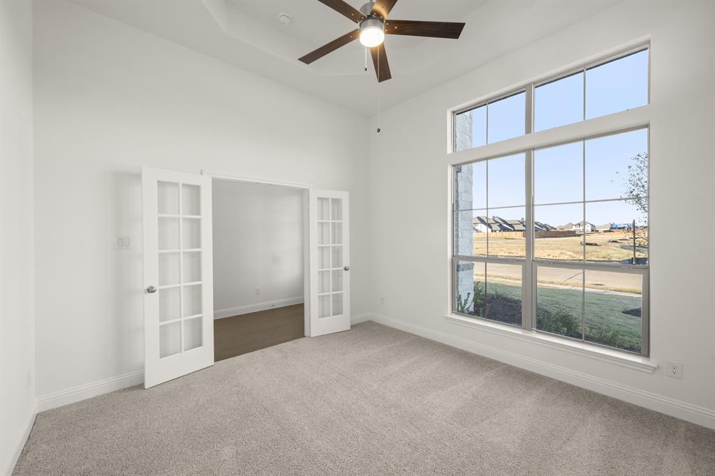 701 Seahawk Street Joshua, TX 76058 - Photo 21 of 30 a view of an empty room with a window