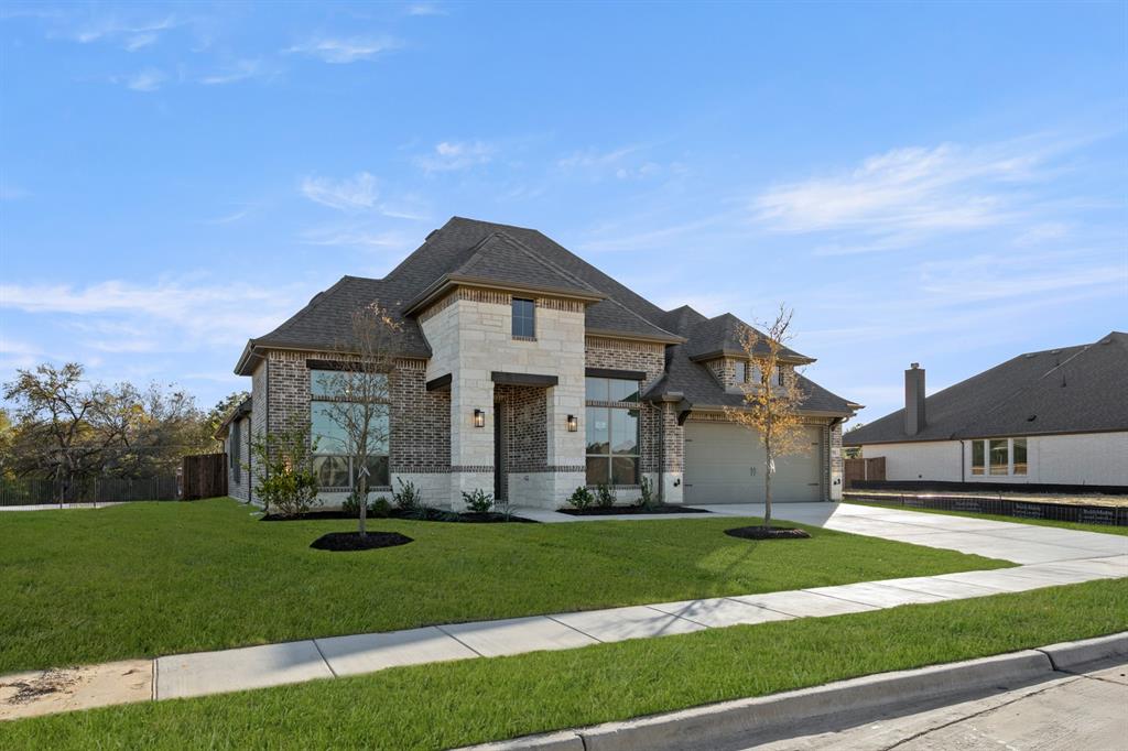 701 Seahawk Street Joshua, TX 76058 - Photo 30 of 30 a front view of a house with a yard
