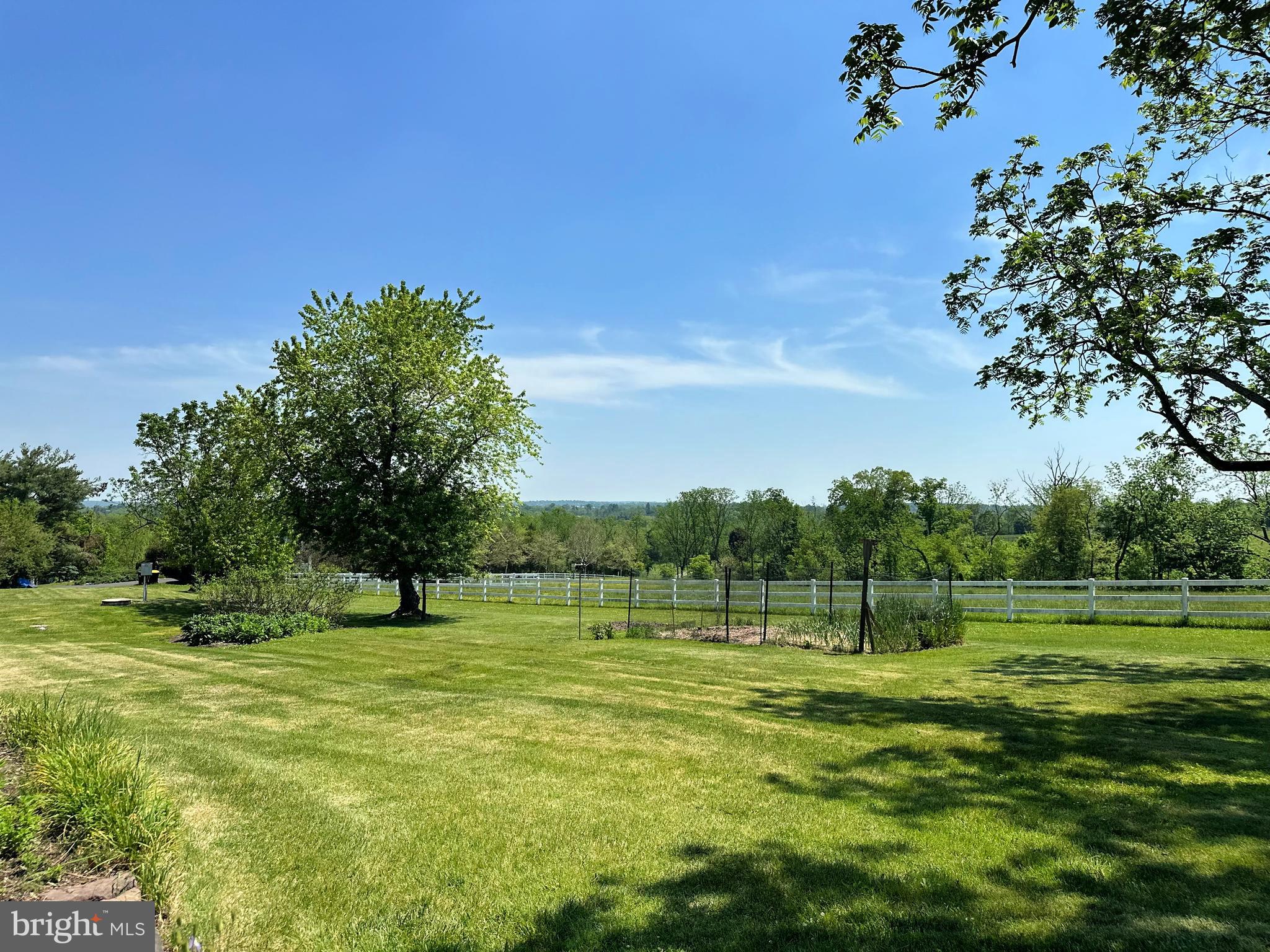 2382 Bergey Road Harleysville, PA 19438 - Photo 12 of 52 a view of a grassy field with trees
