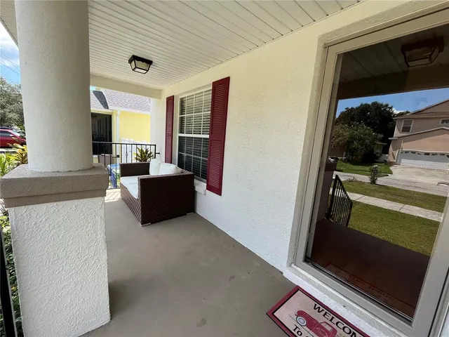 a view of a kitchen with a sink and a kitchen view