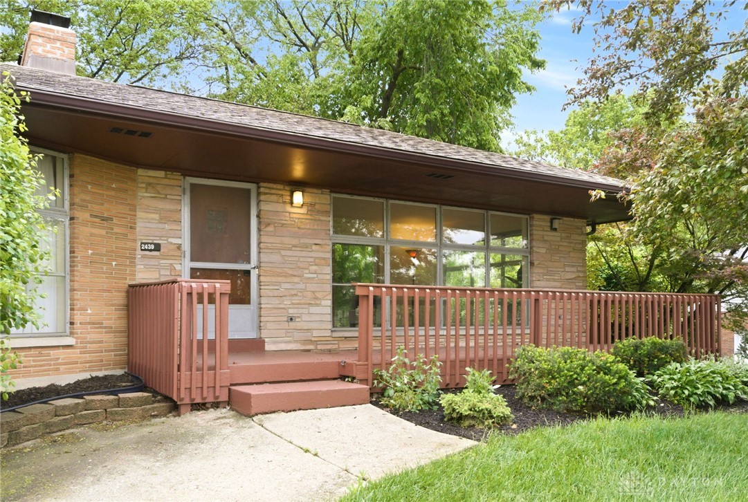 2439 Mayfair Road Dayton, OH 45405 - Photo 41 of 41 This charming home offers a lovely blend of stone and wood with a welcoming porch.