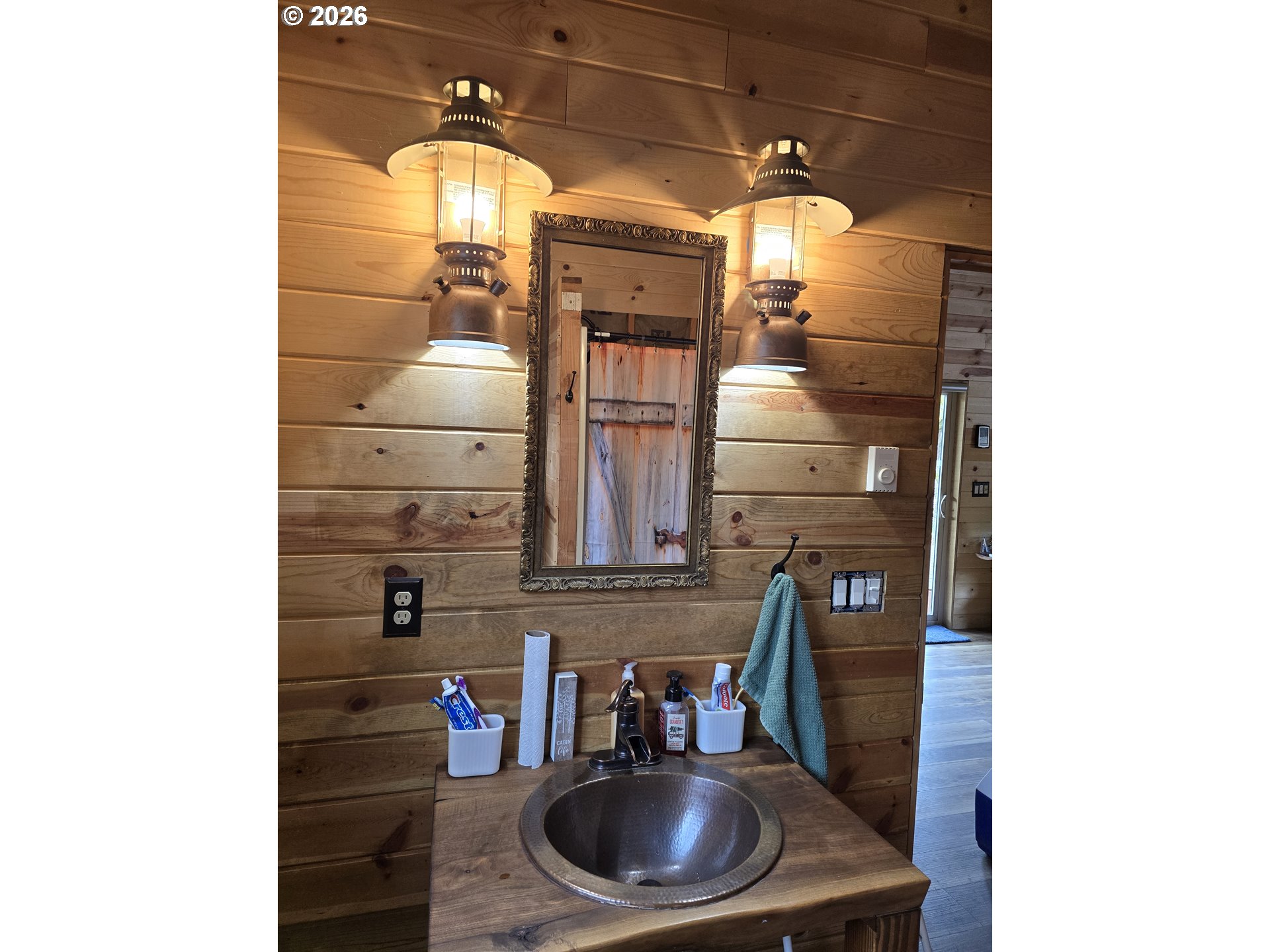 84665 Grande Ronde Road Enterprise, OR 97828 - Photo 11 of 27 a bathroom with a sink and a mirror