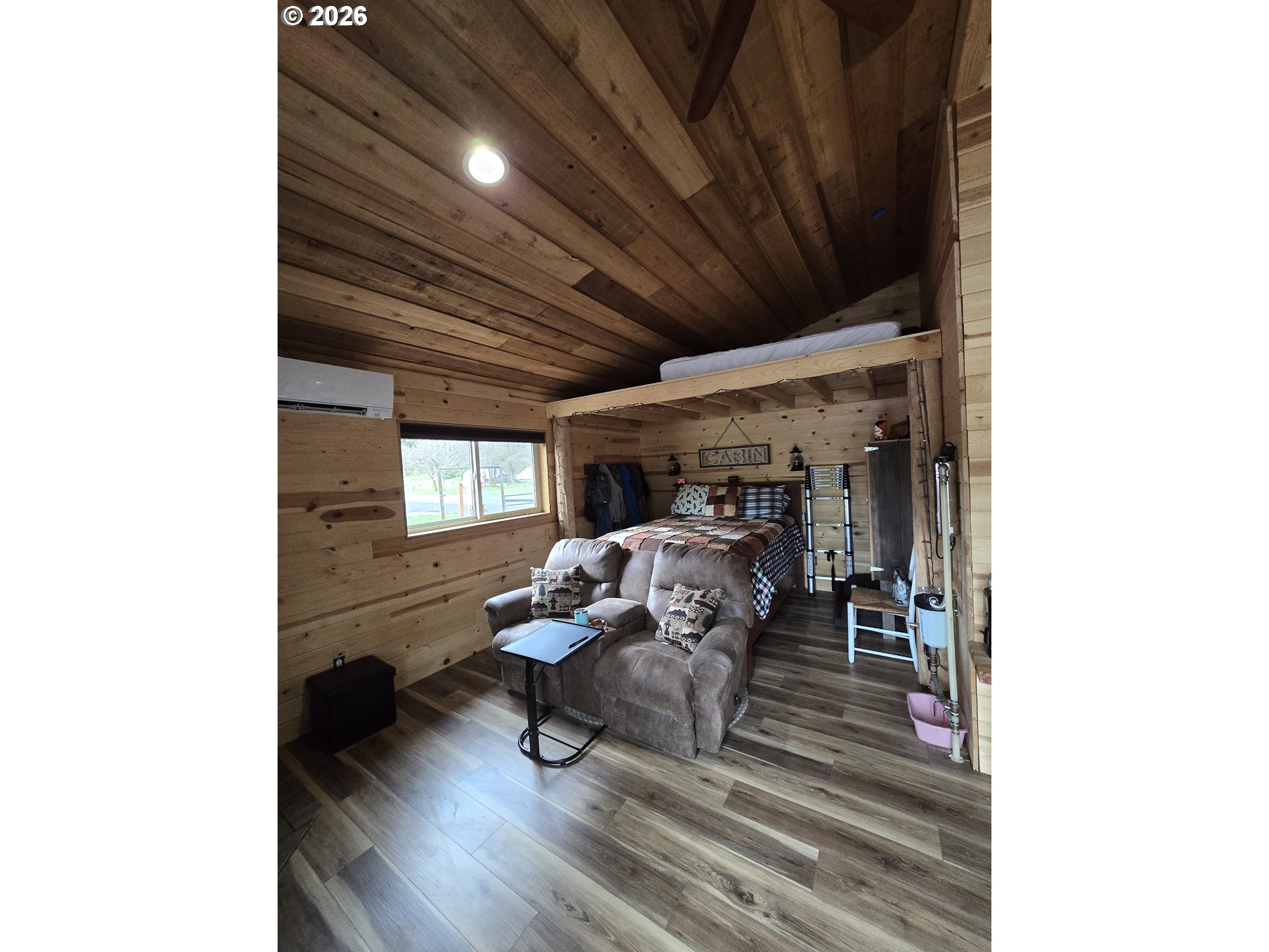 84665 Grande Ronde Road Enterprise, OR 97828 - Photo 23 of 27 a living room with furniture and a wooden floor