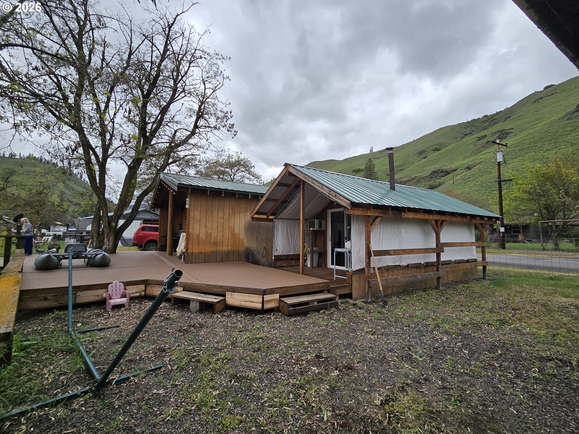 84665 Grande Ronde Road Enterprise, OR 97828 - Photo 26 of 27 a house view with a backyard space