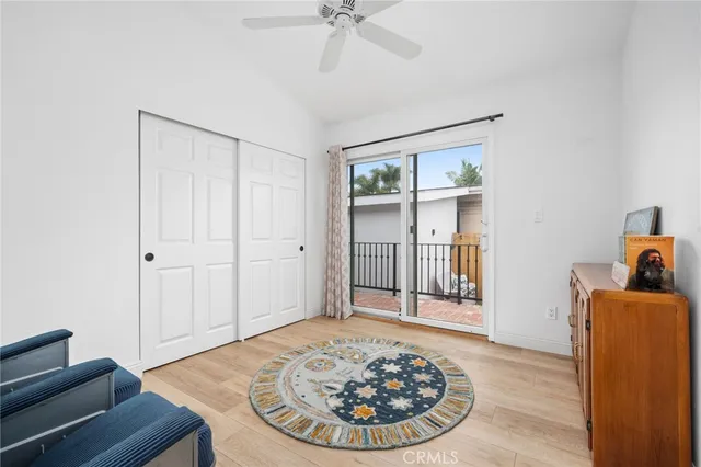 a room with a chair and a dresser