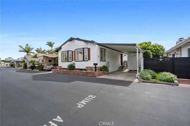a view of a house with a street