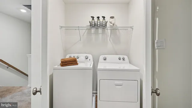 a bathroom with a sink toilet and mirror