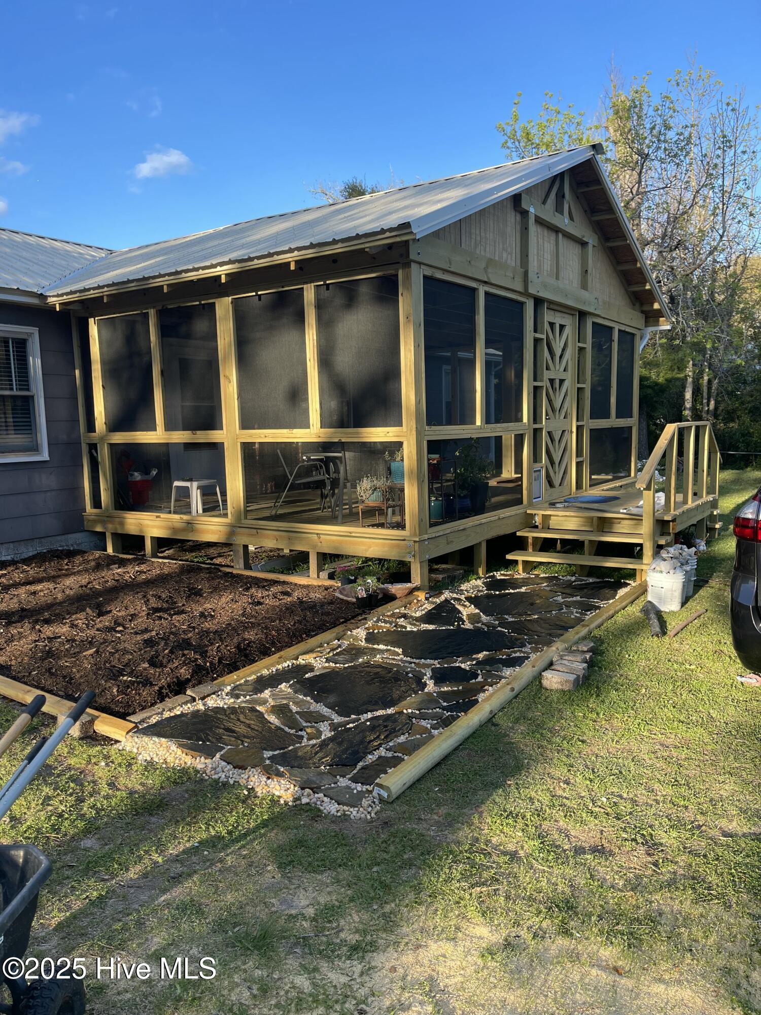376 Shell Road Atlantic, NC 28511 - Photo 29 of 49 Landscape bed to fill with flowers and your favorite coastal plantings.