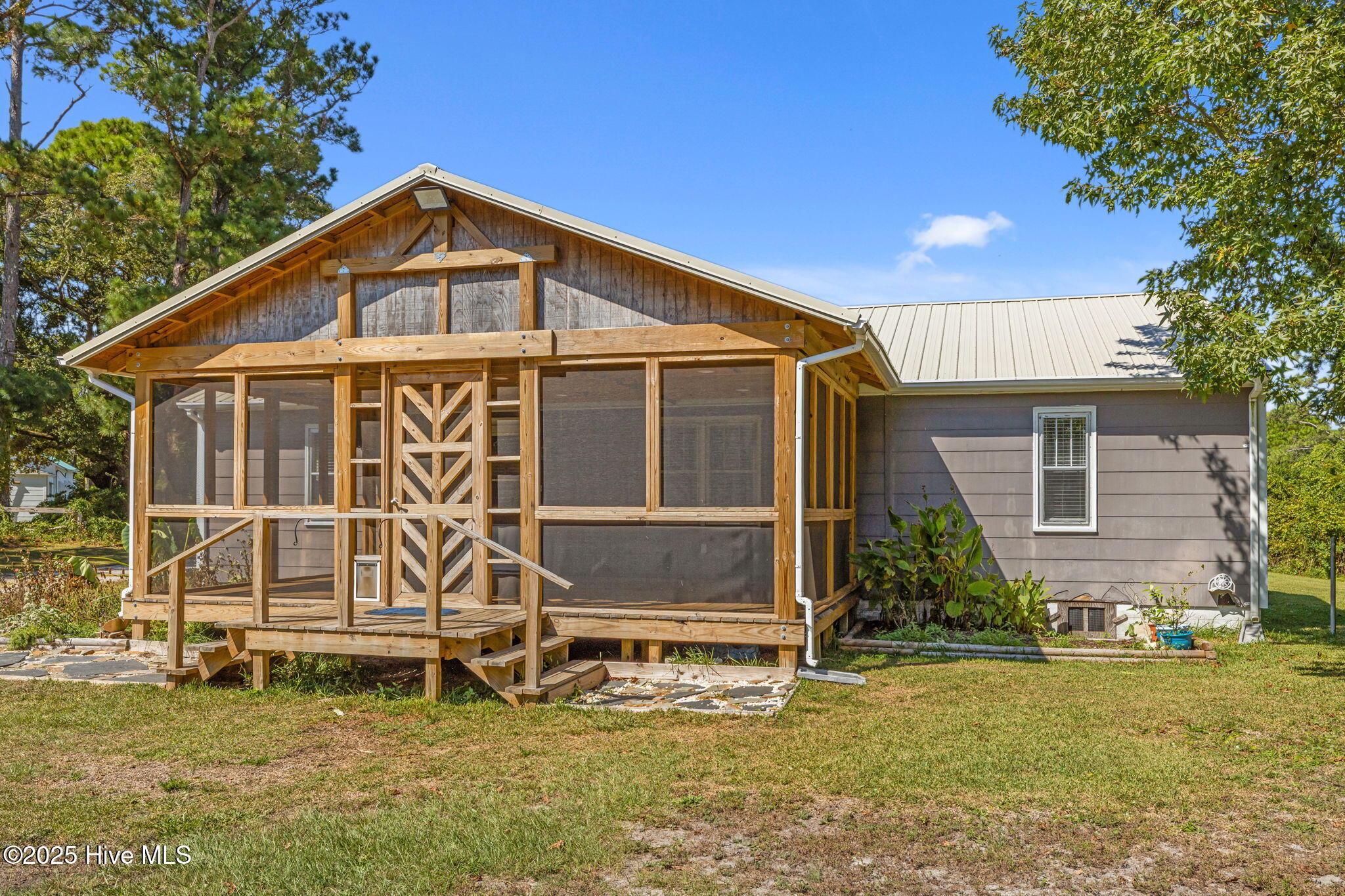 376 Shell Road Atlantic, NC 28511 - Photo 32 of 49 Screen porch exterior