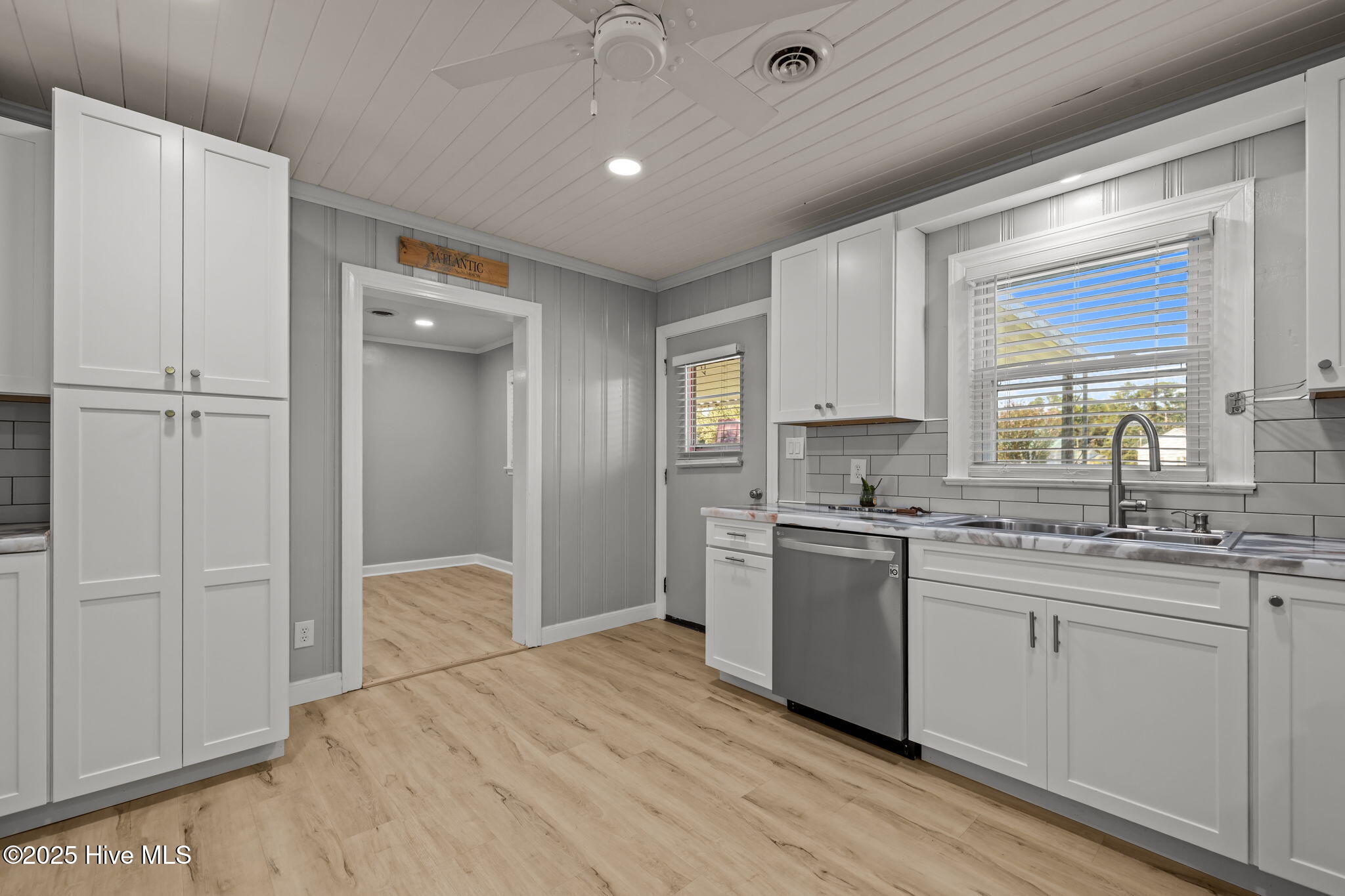 376 Shell Road Atlantic, NC 28511 - Photo 8 of 49 Carport entrance and kitchen leads to dining/flex space