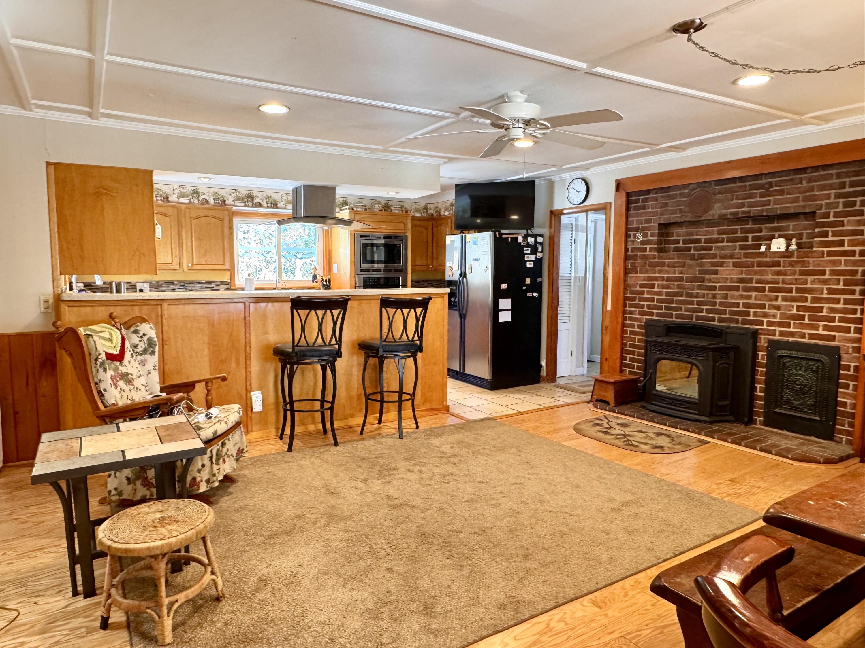 679 Neck Road China, ME 04358 - Photo 12 of 23 pellet stove, so cozy!