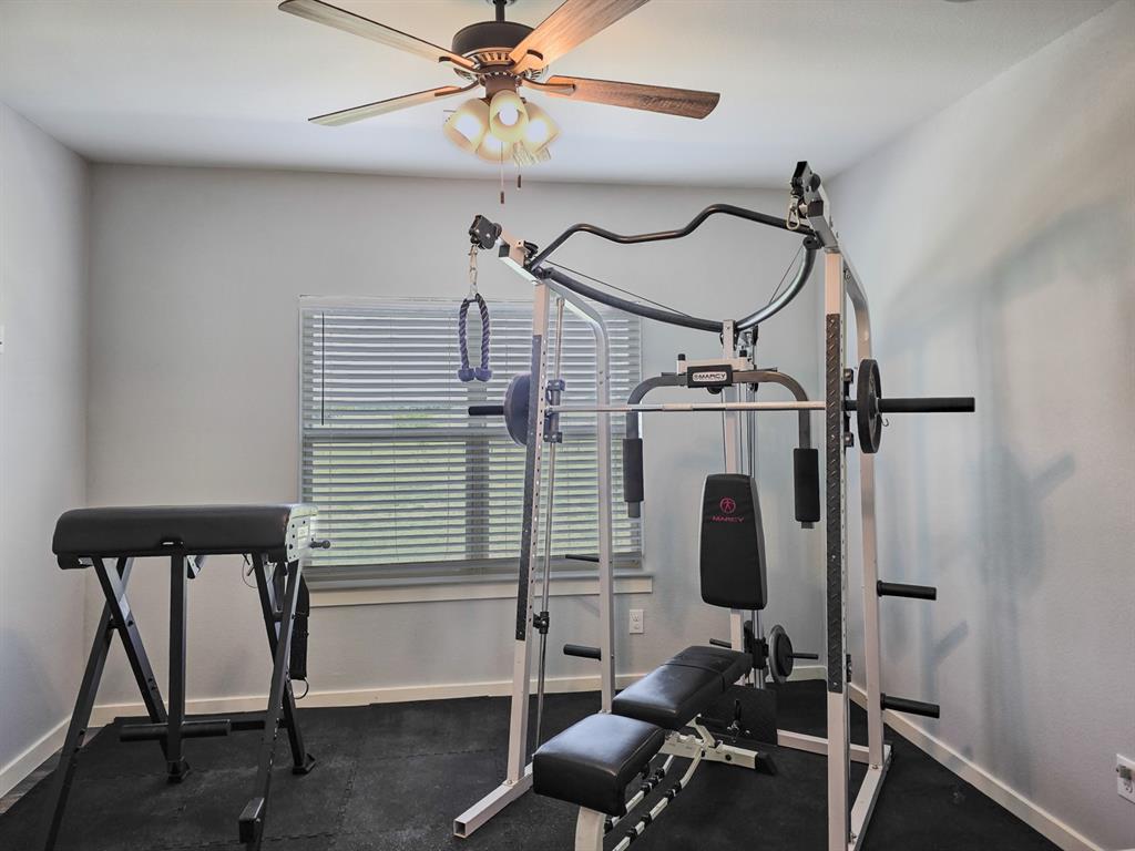 14910 Old Stoney Road Ponder, TX 76259 - Photo 28 of 36 a view of a room with gym equipment