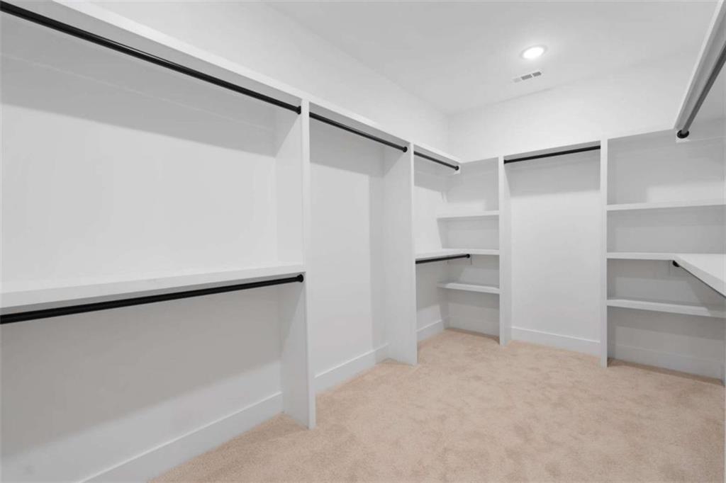 11691 Hazelbrand Road Northeast Covington, GA 30014 - Photo 37 of 53 a view of an empty walk in closet