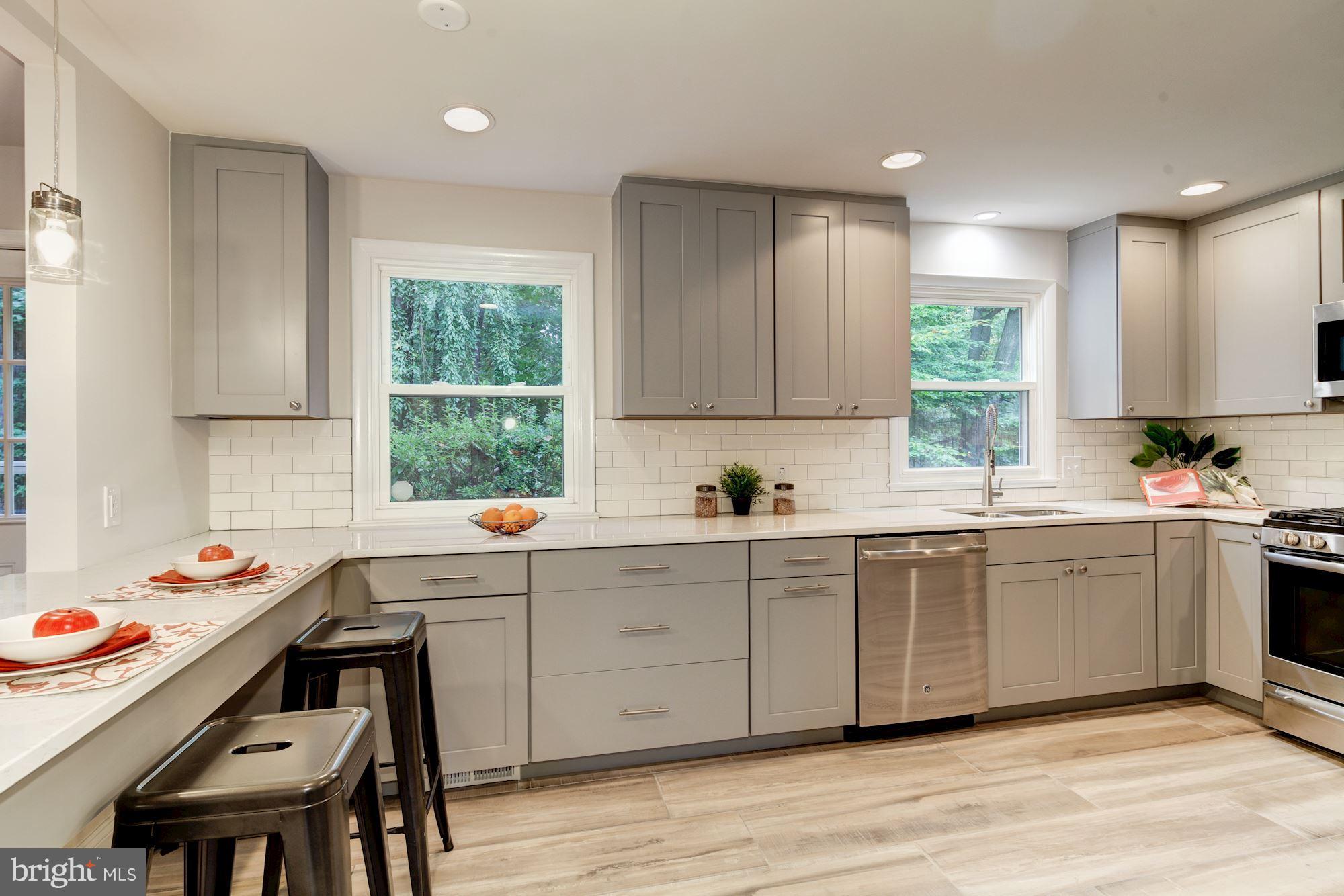 2209 Forest Ridge Road Lutherville-Timonium, MD 21093 - Photo 1 of 30 Breakfast bar with views to family room.