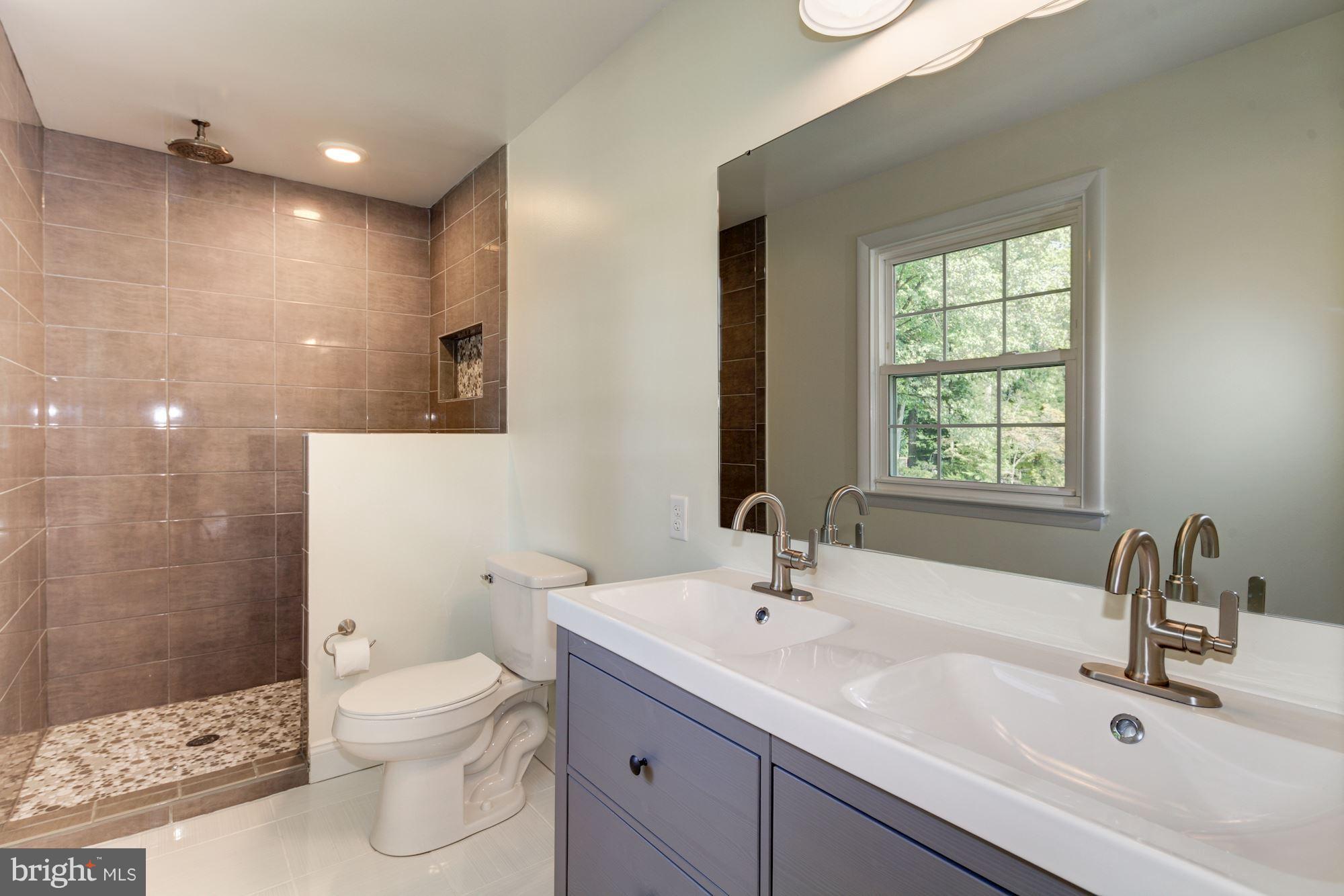 2209 Forest Ridge Road Lutherville-Timonium, MD 21093 - Photo 17 of 30 New master bath with custom tile work