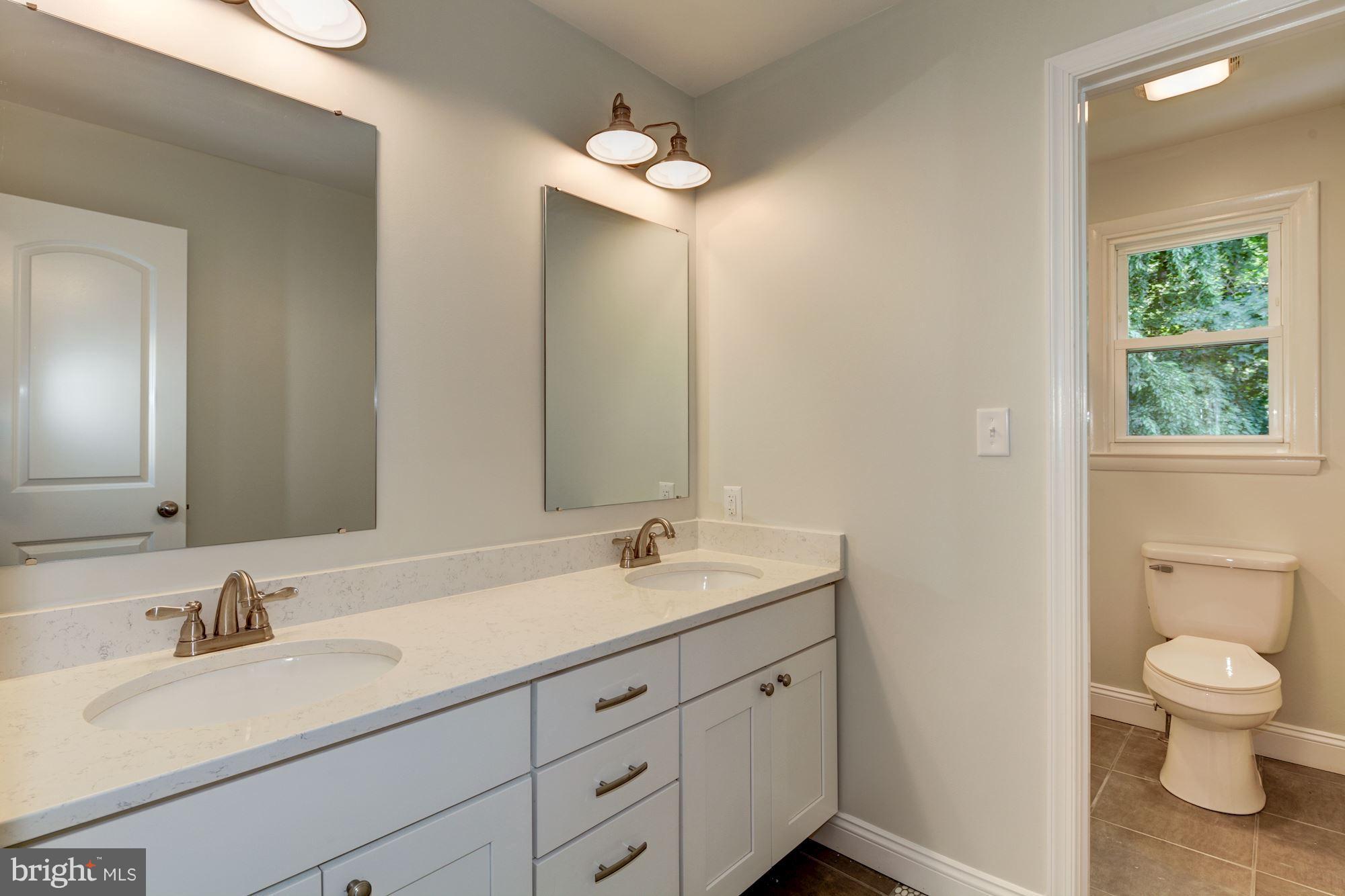 2209 Forest Ridge Road Lutherville-Timonium, MD 21093 - Photo 24 of 30 Hall bath with double sinks
