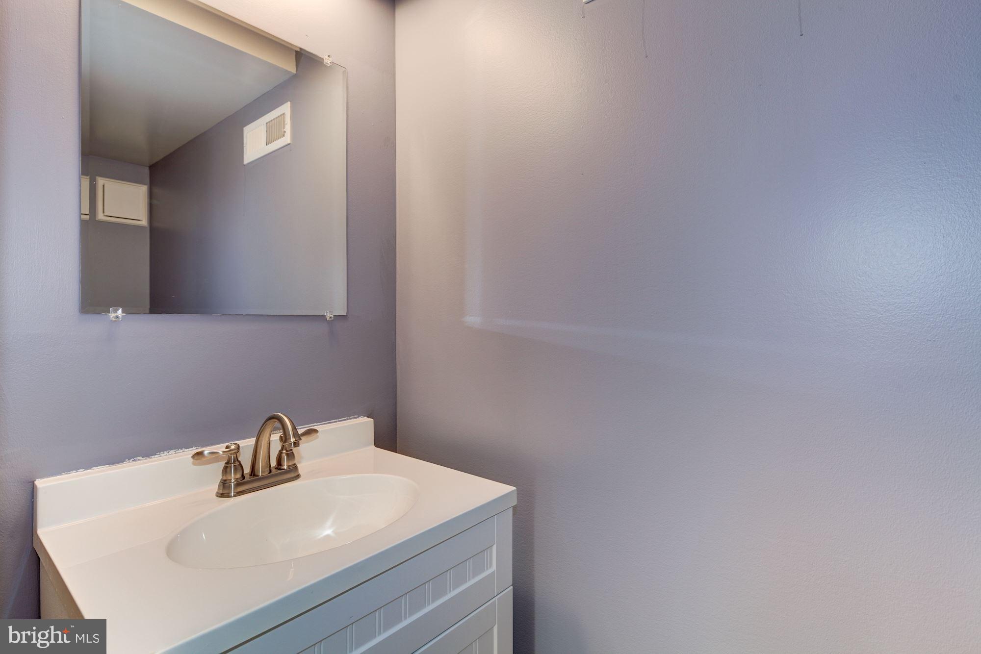 2209 Forest Ridge Road Lutherville-Timonium, MD 21093 - Photo 28 of 30 Half bath in lower level