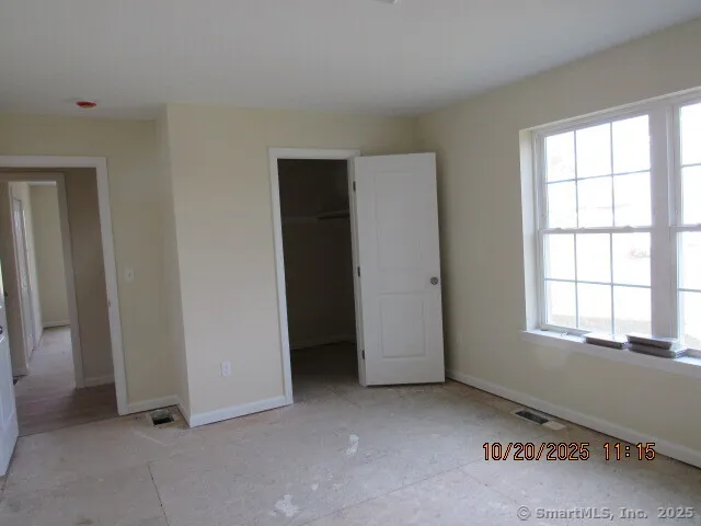 an empty room with windows