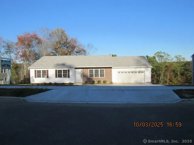 a view of house with yard