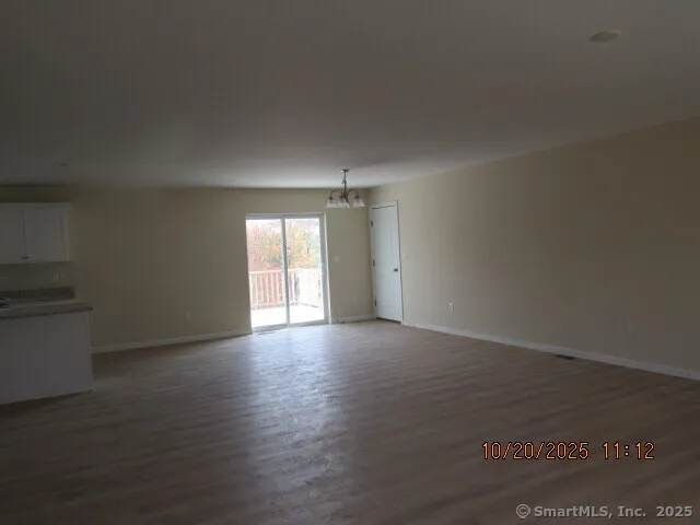 a view of an empty room and window