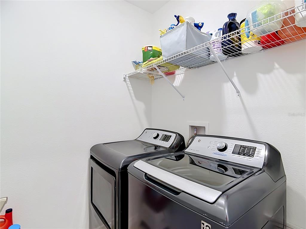 1633 Red Loop Lakeland, FL 33801 - Photo 42 of 60 a utility room with dryer and washer