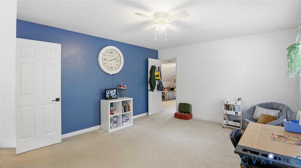 10716 Chalkley Road Richmond, VA 23237 - Photo 37 of 46 a view of workspace with a couch