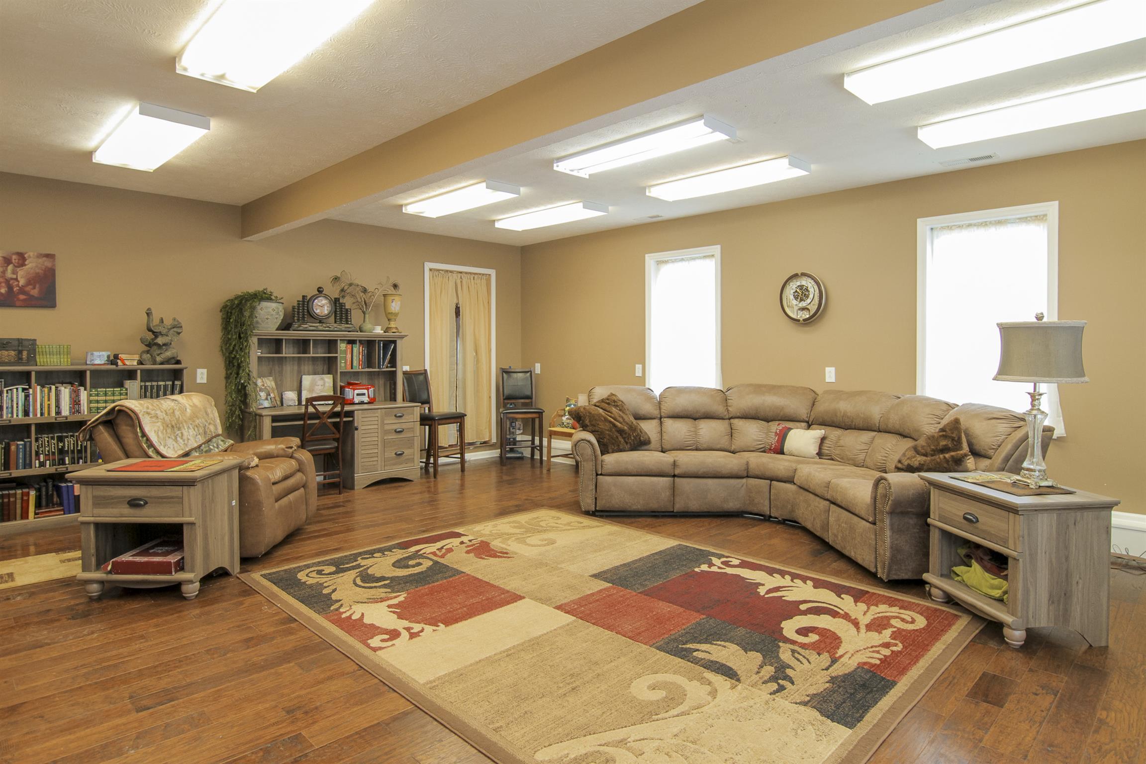 215 Buffalo Road Pleasant Shade, TN 37145 - Photo 13 of 30 a living room with furniture and a rug