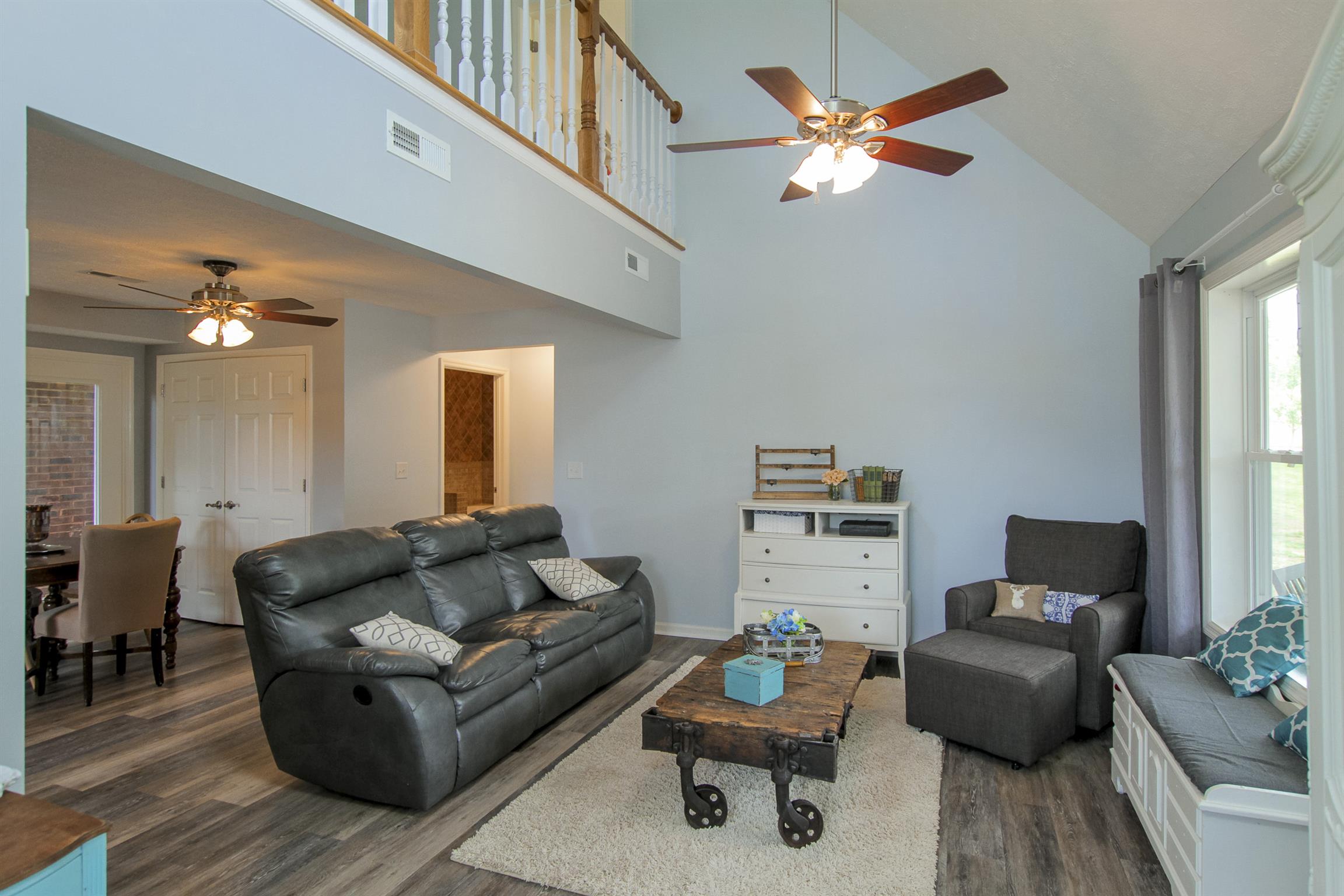 215 Buffalo Road Pleasant Shade, TN 37145 - Photo 26 of 30 a living room with furniture and a large window