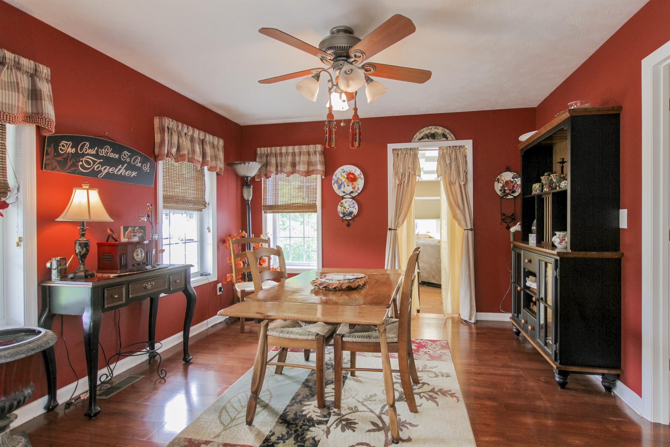 215 Buffalo Road Pleasant Shade, TN 37145 - Photo 8 of 30 a view of a dining room with furniture window and wooden floor