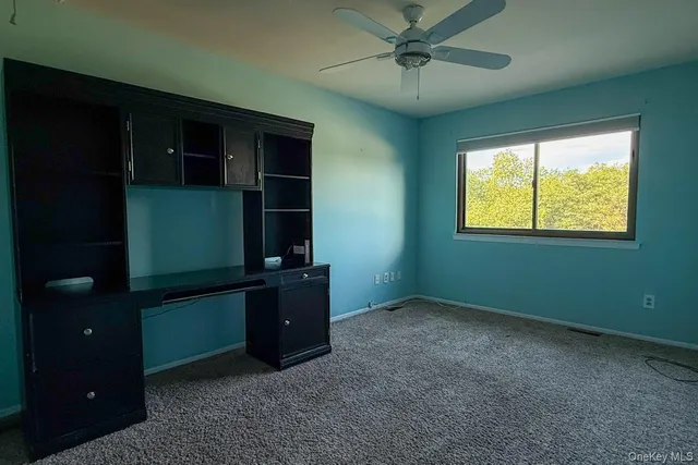 wooden floor and window in an empty room