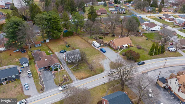 an aerial view of a houses with outdoor space