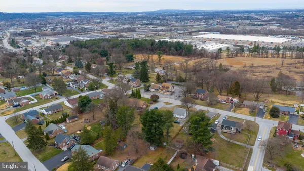 an aerial view of residential building and lake view