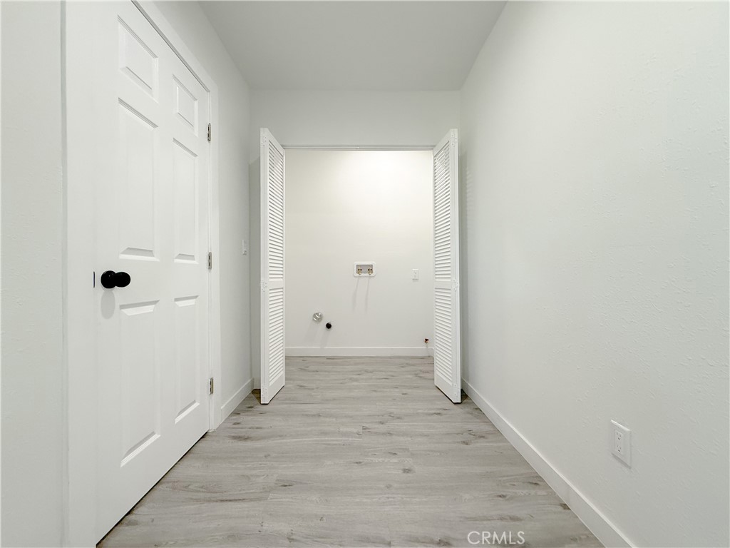 511 North Albertson Avenue Compton, CA 90220 - Photo 22 of 25 a view of a room with wooden floor
