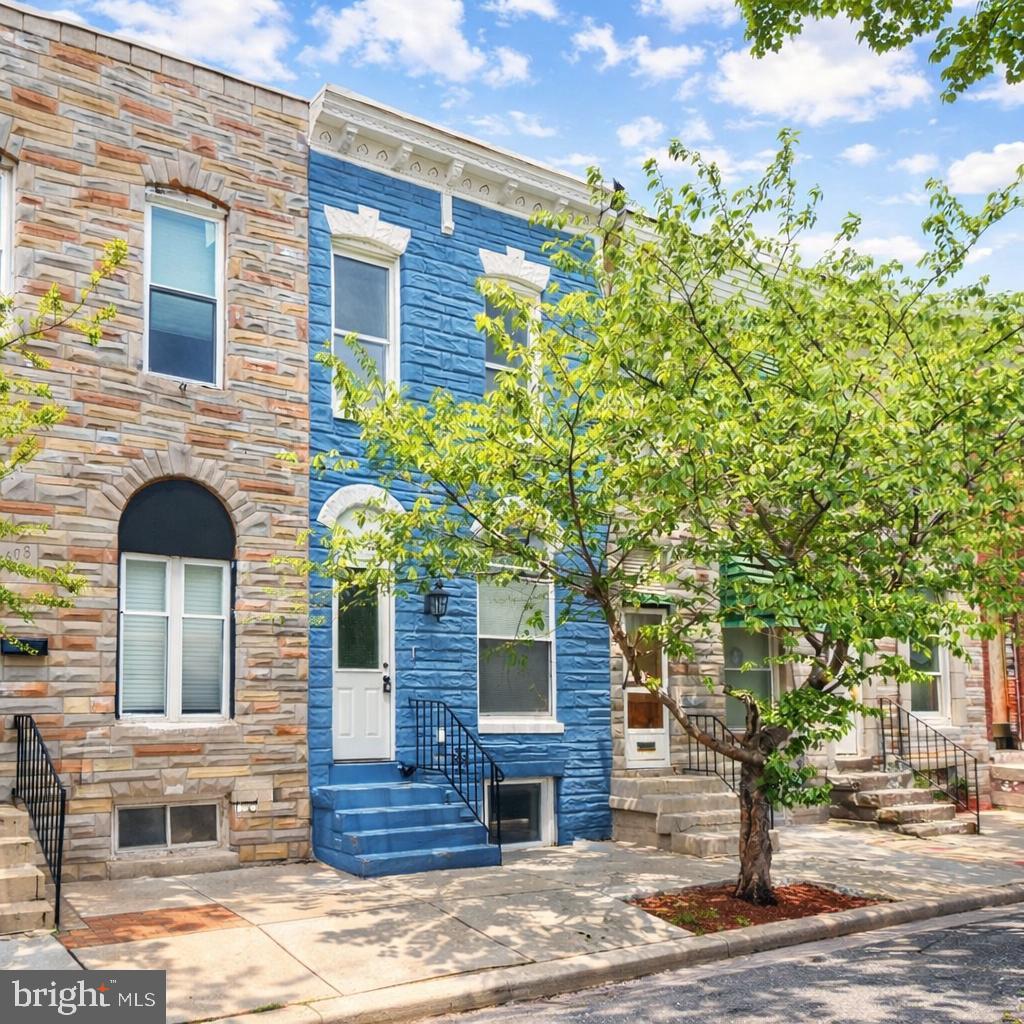 Charming blue facade in a vibrant street.