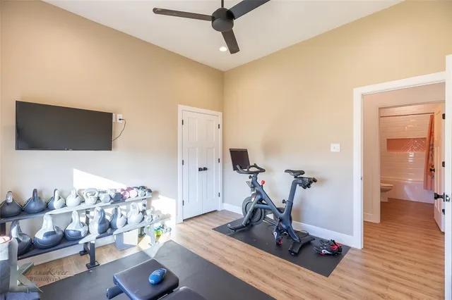 a view of a livingroom with furniture and wooden floor