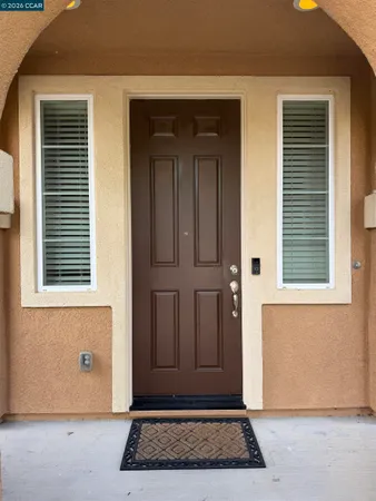a view of entryway with bathroom