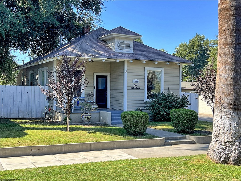 4330 Tenth Street Riverside, CA 92501 - Photo 1 of 1 a front view of a house with garden