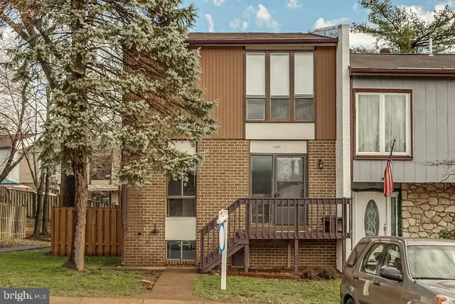 front view of house with a small yard