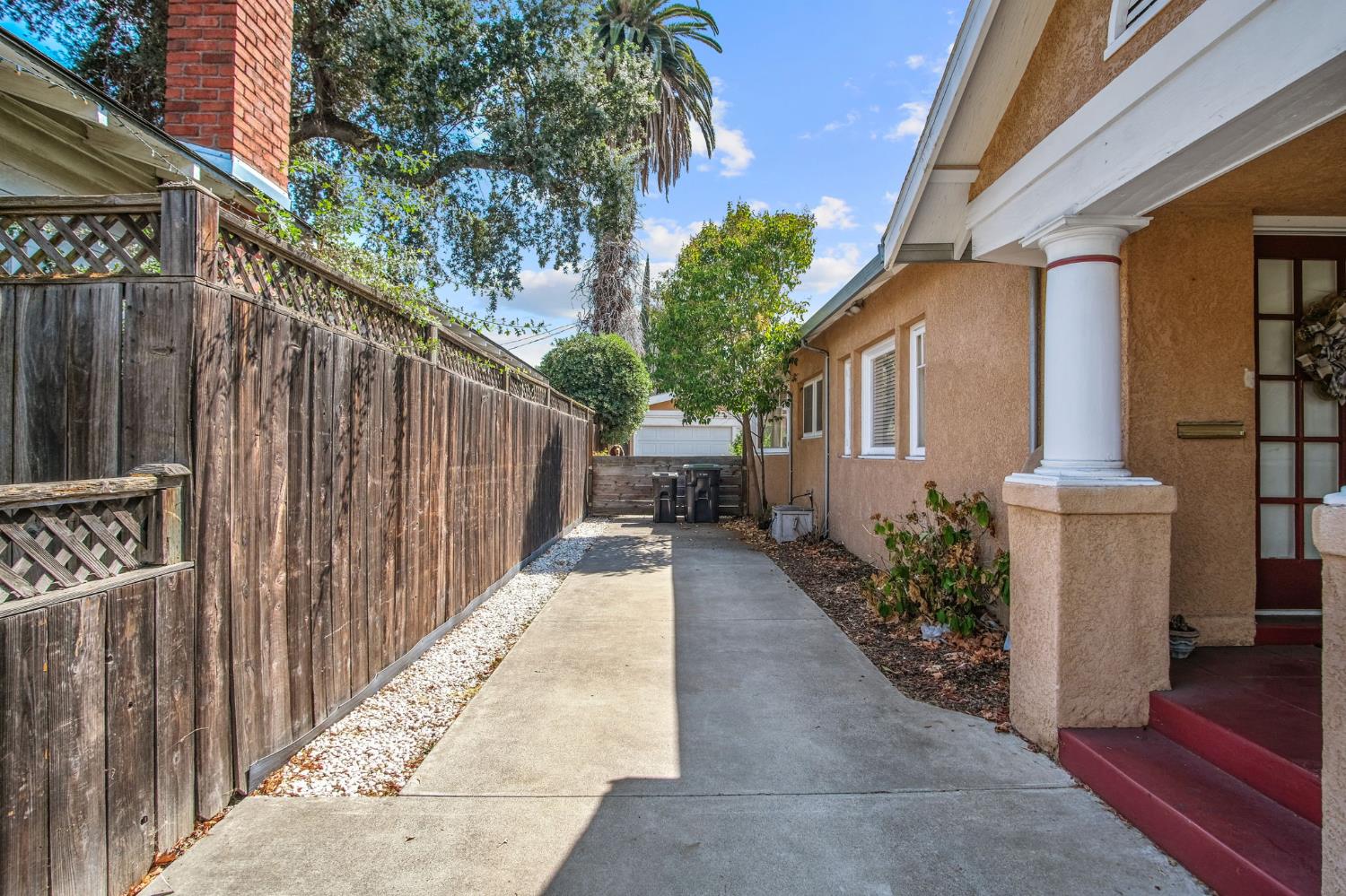 930 West Harding Way Stockton, CA 95203 - Photo 3 of 22 a view of a house with backyard and sitting area